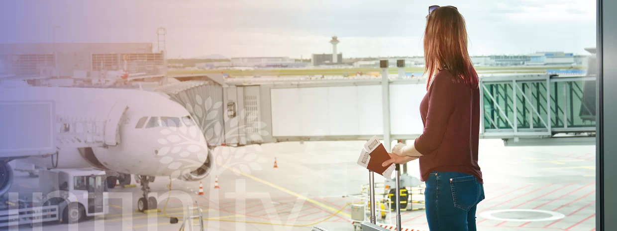 woman-hold-passport-at-the-airport-travel-on-plane-blog-banner